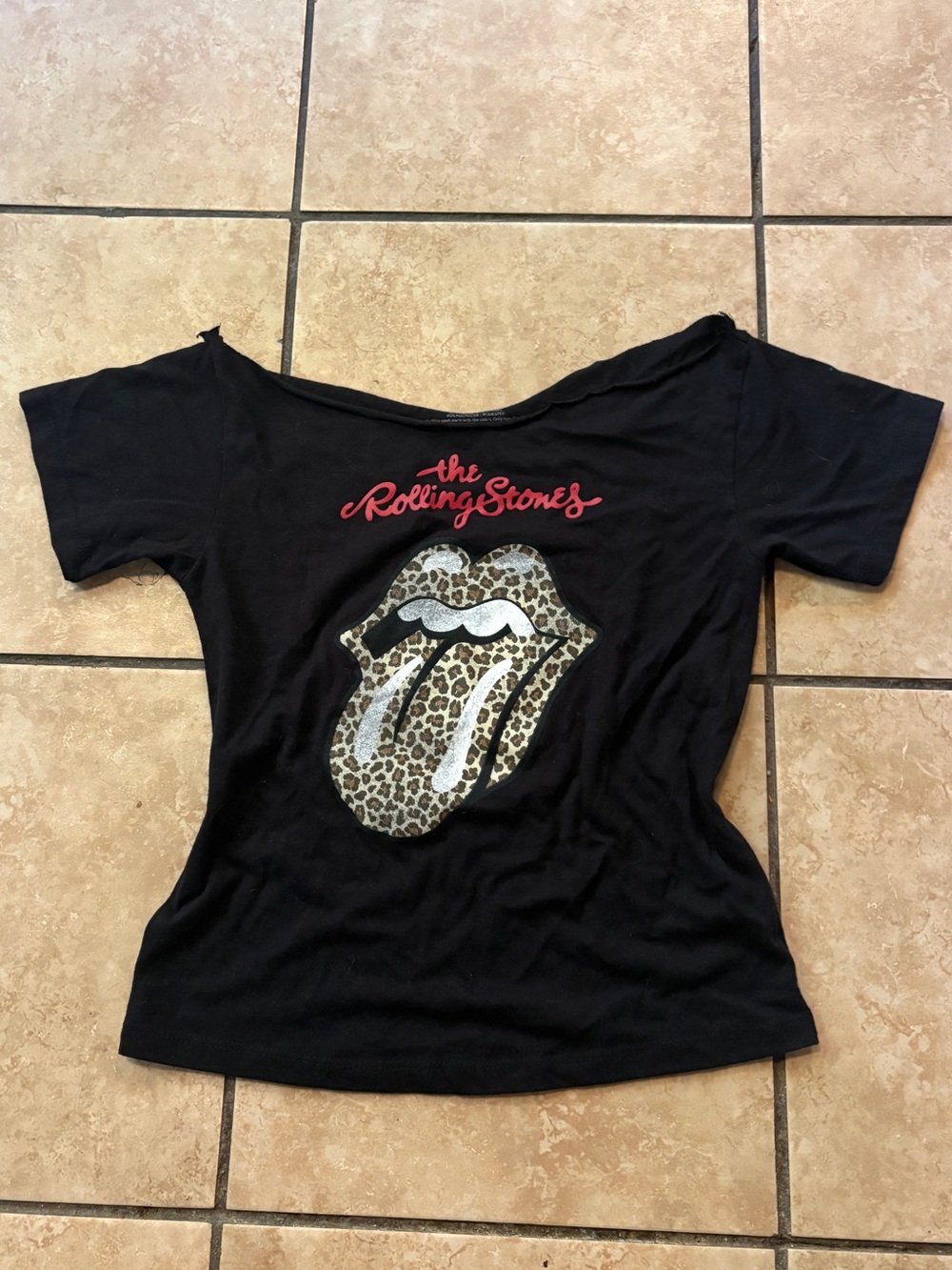 the Rolling Stones Black Women’s Tee with Leopard Tongue Graphic